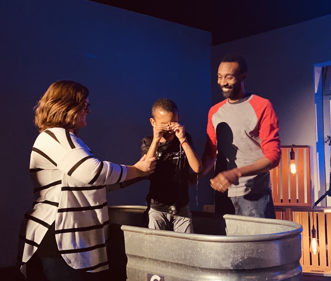 being raised from water after being baptised